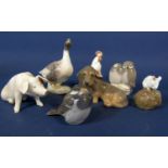 A collection of seven Royal Copenhagen figures of animals and birds including a dachshund 3140, a