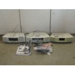 A Bose wave radio cd, model AWRC-2P, Bose wave music system model AWRCC6 (lacks screen) and a