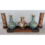 A collection of Chinese cloisonné pots to include simulated bamboo type pots upon wooden stands,