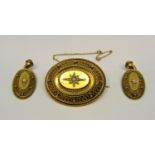 Etruscan style yellow metal demi-parure comprising mourning brooch and pair of drop earrings, with