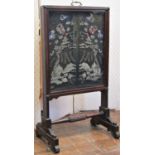 A Regency mahogany fire screen of versatile construction, the central panel (with later detail) with