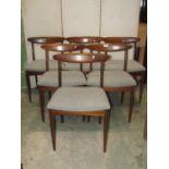 A Greeves & Thomas teak D end pull out extending dining table, with two additional leaves, moulded