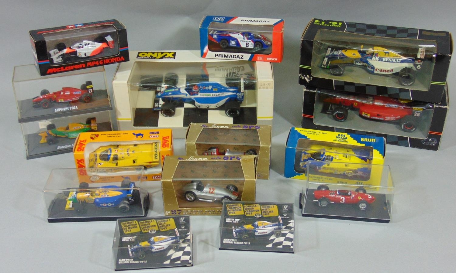 Mixed collection of boxed model racing cars including Onyx 1:24 5003, 5001 and 5005, 2x 1:43 Brumm