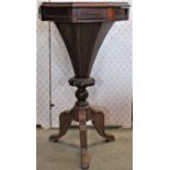 A Victorian rosewood veneered trumpet shaped sewing table/work box, the octagonal top with hinged