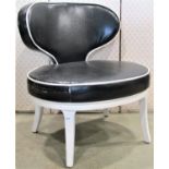 A contemporary but retro style chair with oval faux black leather upholstered pad seat and shaped