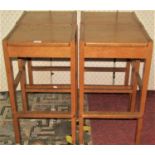 A set of four medium to light oak arts and crafts style stools, with square seats raised on