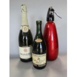 Bottles of Remy Martin Cognac, Rondel Cava and a soda siphon (3)