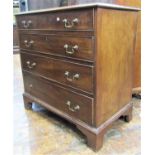 A small Georgian mahogany chest of four long graduated drawers on bracket supports, 78cm wide