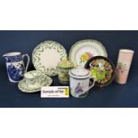 A collection of Royal Albert teawares with green printed floral swag detail comprising a pair of