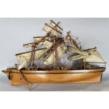 A scale model of a three masted vessel , 70cm long