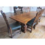 A good quality Elizabethan style oak refectory table, the heavy planked top with cleated ends,