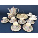 A collection of Royal Winton Old Cottage chintz coffee wares comprising coffee pot, cream jug, sugar