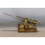 Trench Art Interest - An artificer-art bell metal and chrome model of a deck gun being a good exampl