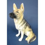 A Beswick fireside model of a seated German Shepherd dog, 34.5cm tall approx, with impressed mark