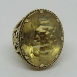 9ct oval citrine cocktail ring, size K/L, 17.5g