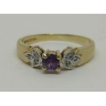 9ct amethyst and diamond dress ring, size N, 2.3g