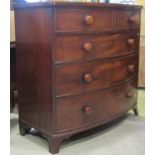 An early 19th century mahogany bow fronted bedroom chest of two short over three long graduated