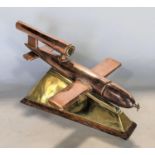 Trench Art Interest - An artificer-art bell metal model of a Doodle Bug or V2 Rocket, raised on a