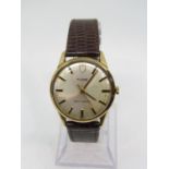 1950s gents 9ct Tudor dress watch, silvered dial with baton markers and gilt hands, 32 mm case,