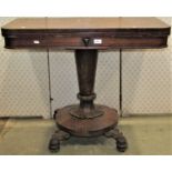 A 19th century rosewood veneered foldover top card table of rectangular form with rounded front