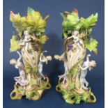 A pair of large late 19th century continental vases with applied dancing classical figures and