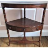 Two Georgian mahogany corner tables fitted with drawers, on square cut and swept supports