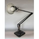 A Herbert Terry anglepoise lamp in a black enamelled colourway