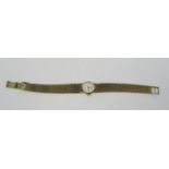 Vintage 9ct ladies Omega dress watch, the champagne dial with baton markers, 16mm dial, currently