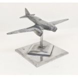 Trench Art Interest - A chromium desk top model of a racing aircraft, 15cm wingspan