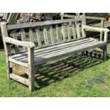 A weathered teak garden/park bench with slatted seat and back (AF),6ft long