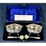 Good pair of oval silver salts with pie crust rims and stylised feet, maker marks worn, Chester