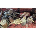 A collection of 19th century and other copperware including kettles, canisters, trivet, house