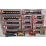 Boxful of model rail boxed rolling stock comprising 4 coaches in chocolate and cream livery