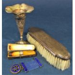 Mixed collection to include an Eastern silver tapered vase, a silver topped dressing brush, a silver