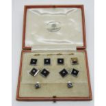Good Art Deco 18ct onyx and platinum dress set, each square onyx panel set with a diamond,