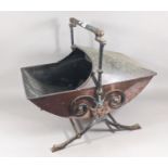 Good quality Arts and Crafts coal scuttle, the body of boat shaped form in copper raised on an