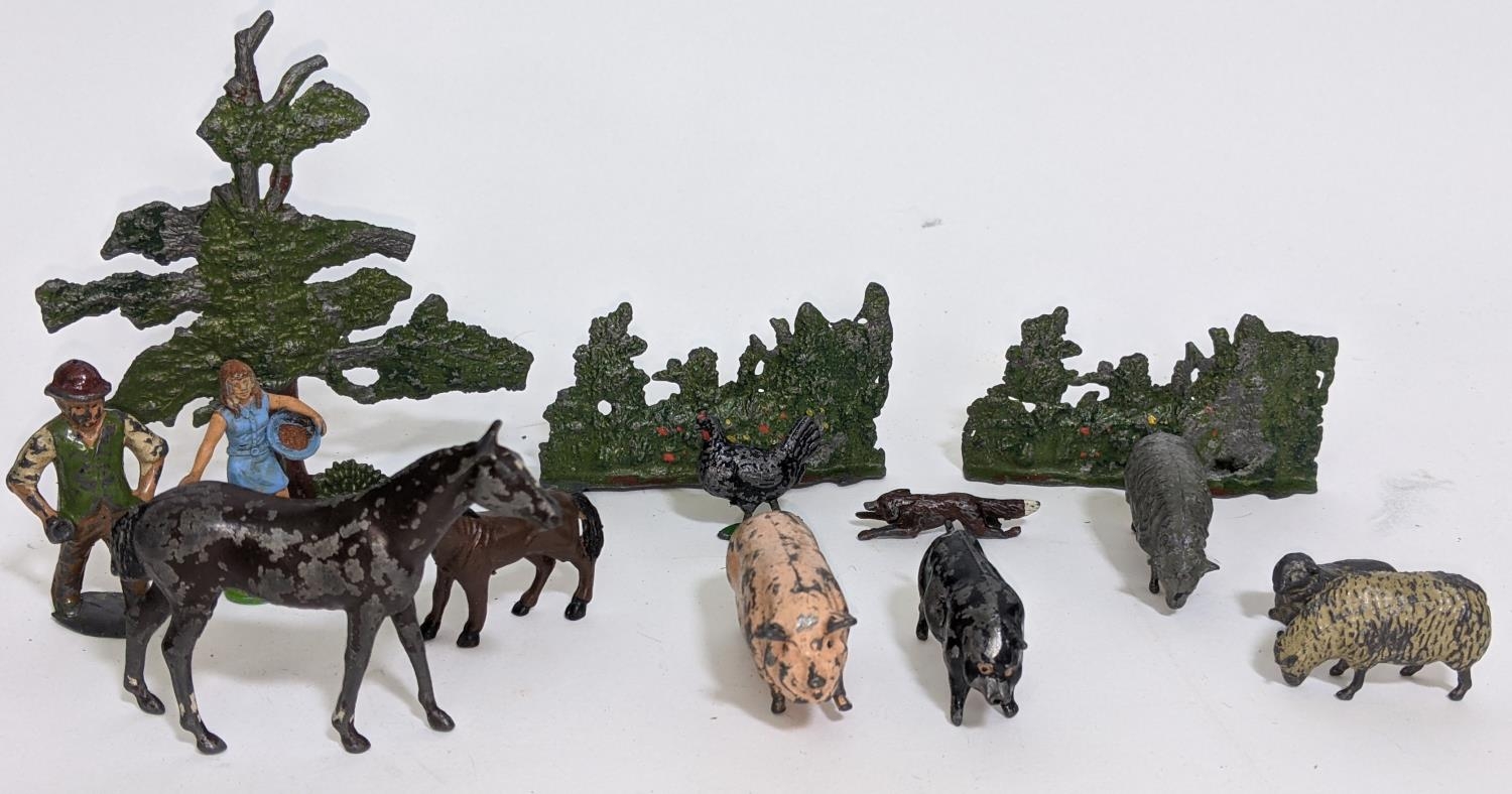 A box of lead painted toys, many by Britains including farm and zoo animals, people, tools, fencing, - Image 2 of 2