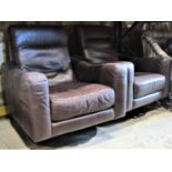 A pair of contemporary stitched faux leather upholstered swivel lounge chairs with slab arms, shaped