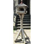 A rustic weathered pine bird table with raised finial, 170cm high approx