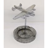 Trench Art Interest - A chromium model of a Lancaster Bomber, with ashtray base, 14cm wingspan
