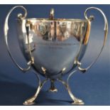 1920s silver presentation trophy with unusual scrolled decoration and three hoof feet, in the art