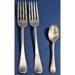 Two similar antique Old English silver table forks, each 20.5cm long; together with a further silver
