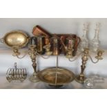 A collection of mixed silver plated including a candelabra, coffee pots, fruit dish, toast rack, two