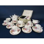 A collection of Royal Crown Derby Posies pattern wares comprising a tea for two set including