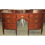 A Georgian mahogany sideboard with satinwood crossbanding, boxwood stringing and shell detail,