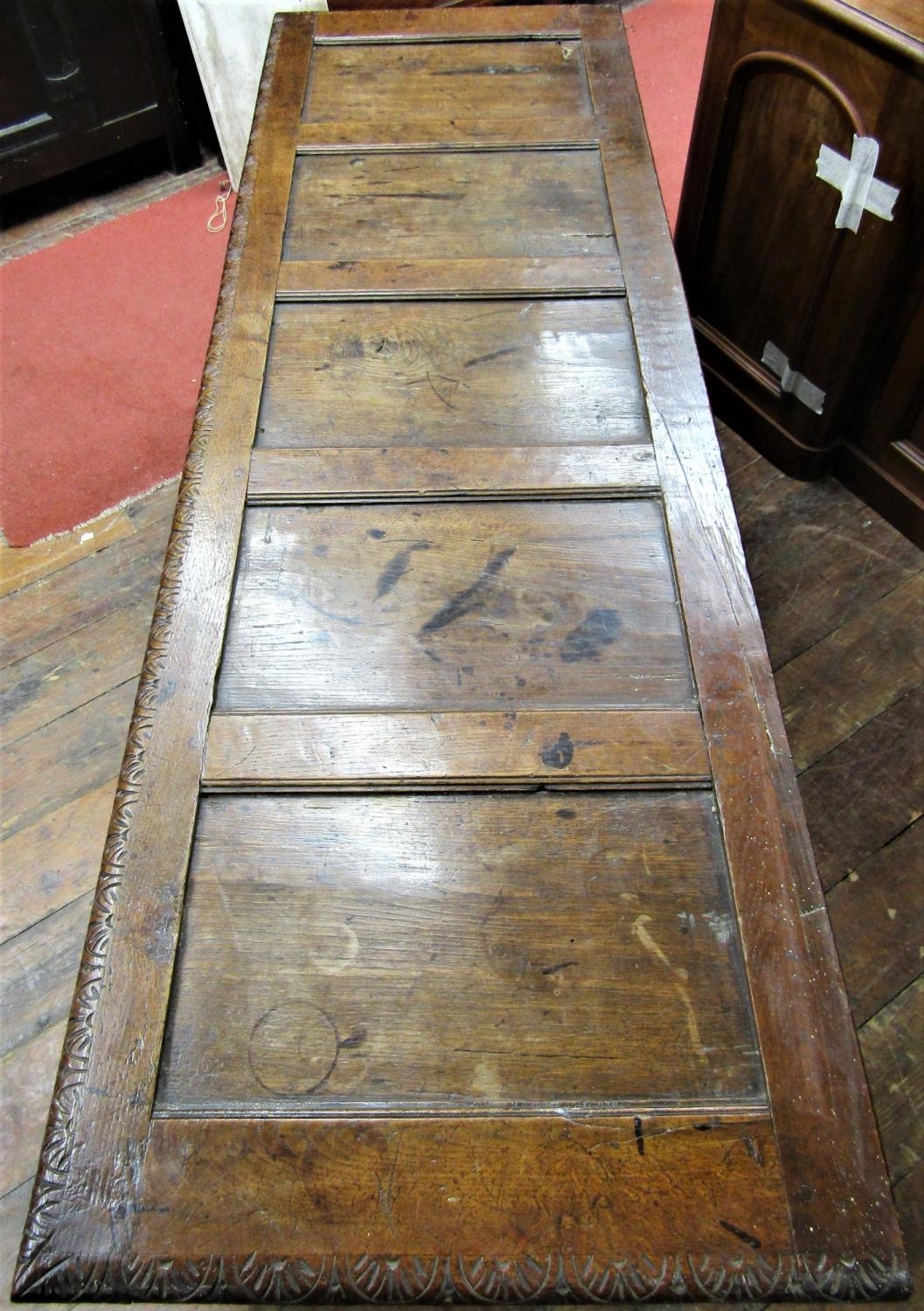 A substantial Georgian oak coffer with repeating geometric detail, within a panelled framework, - Image 2 of 7