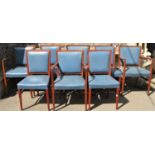 Eight matching Gordon Russell of Broadway teak framed dining chairs with blue rexine upholstered