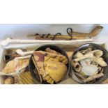 A collection of archaic finds including early slipware fragments, clay pipe and other shards