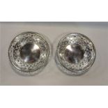 A pair of circular pierced silver bon bon dishes, 11cm diameter, Birmingham 1912, 5oz approx