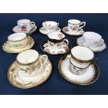 A collection of eight decorative sets of cabinet cups and saucers including 19th century continental